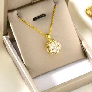 NWT cubic zirconia flower pendent on gold stainless steel chain necklace